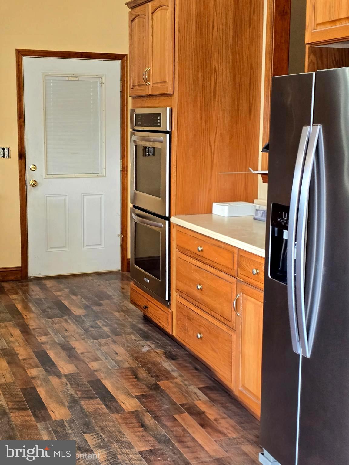 6859 Wertzville Road Enola, PA 17025 - Photo 19 of 60 a kitchen with stainless steel appliances a refrigerator and cabinets