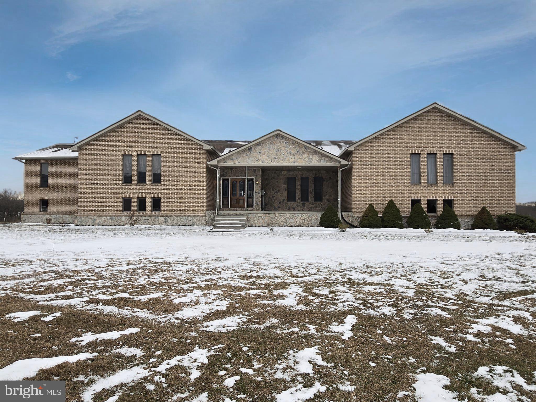 6859 Wertzville Road Enola, PA 17025 - Photo 2 of 60 a front view of a house with a yard