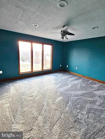 an empty room with a natural light