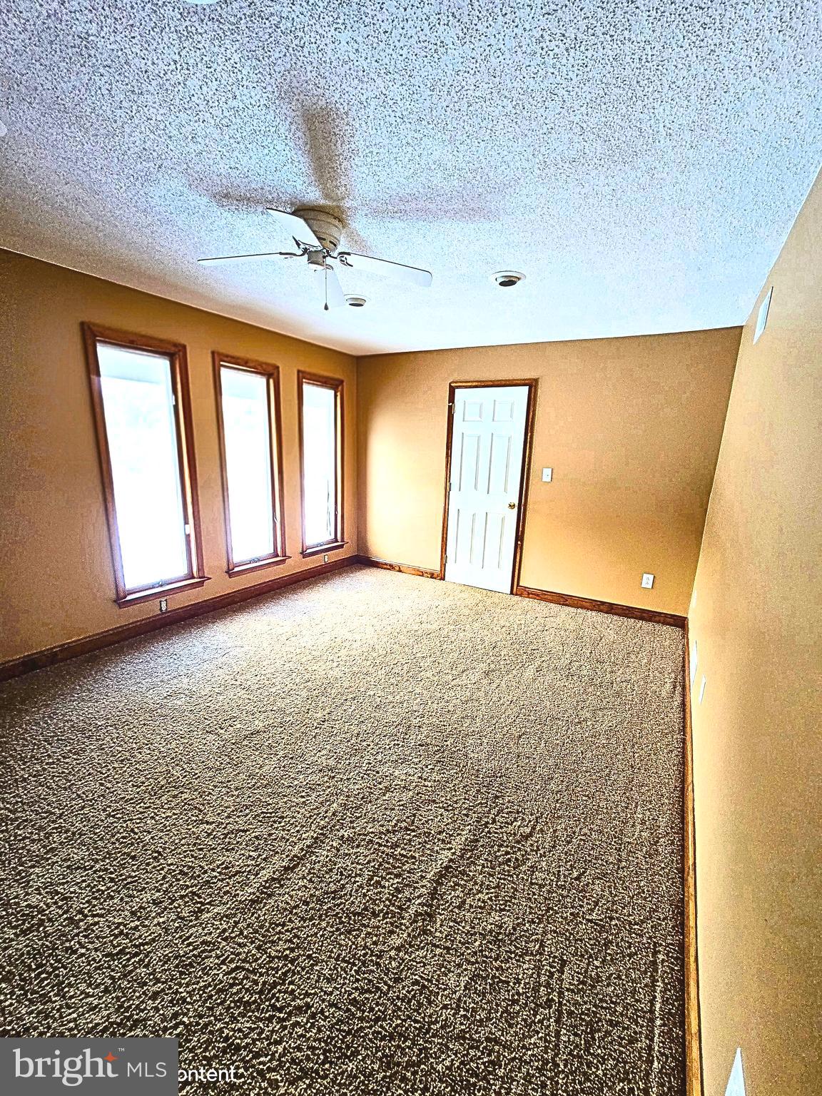 6859 Wertzville Road Enola, PA 17025 - Photo 38 of 60 a view of an empty room with a window
