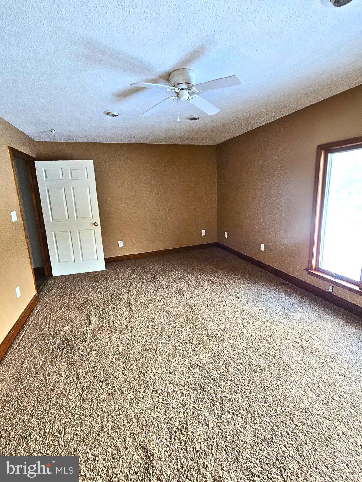 6859 Wertzville Road Enola, PA 17025 - Photo 39 of 60 a view of an empty room with a window