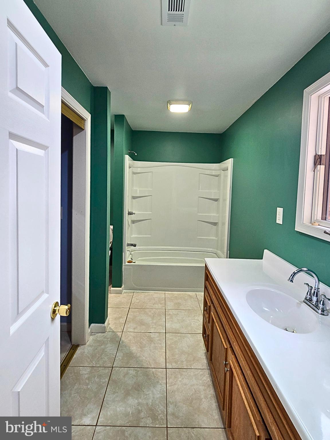 6859 Wertzville Road Enola, PA 17025 - Photo 44 of 60 a bathroom with a sink a toilet and mirror