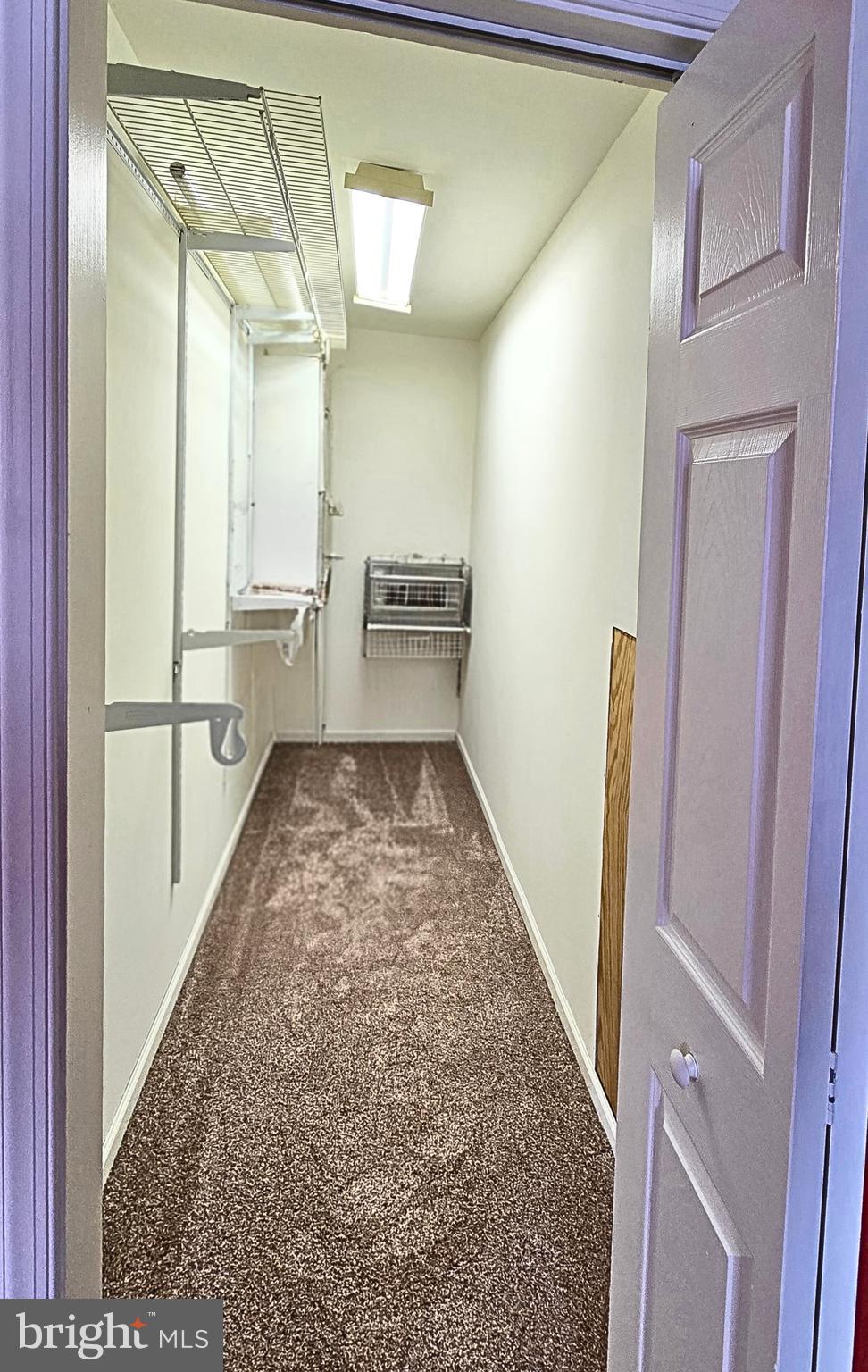 6859 Wertzville Road Enola, PA 17025 - Photo 47 of 60 a view of a hallway with wooden floor and staircase