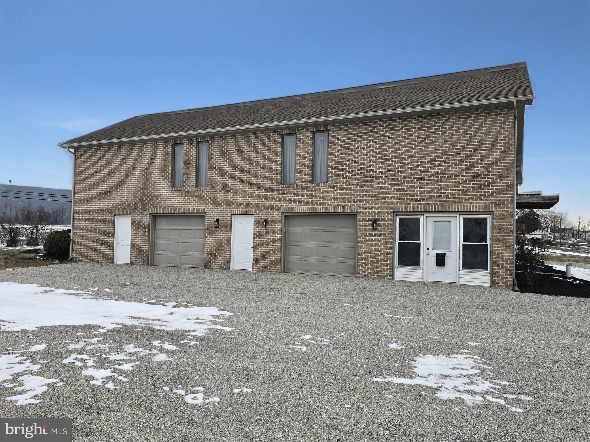 6859 Wertzville Road Enola, PA 17025 - Photo 6 of 60 a front view of a house with a yard