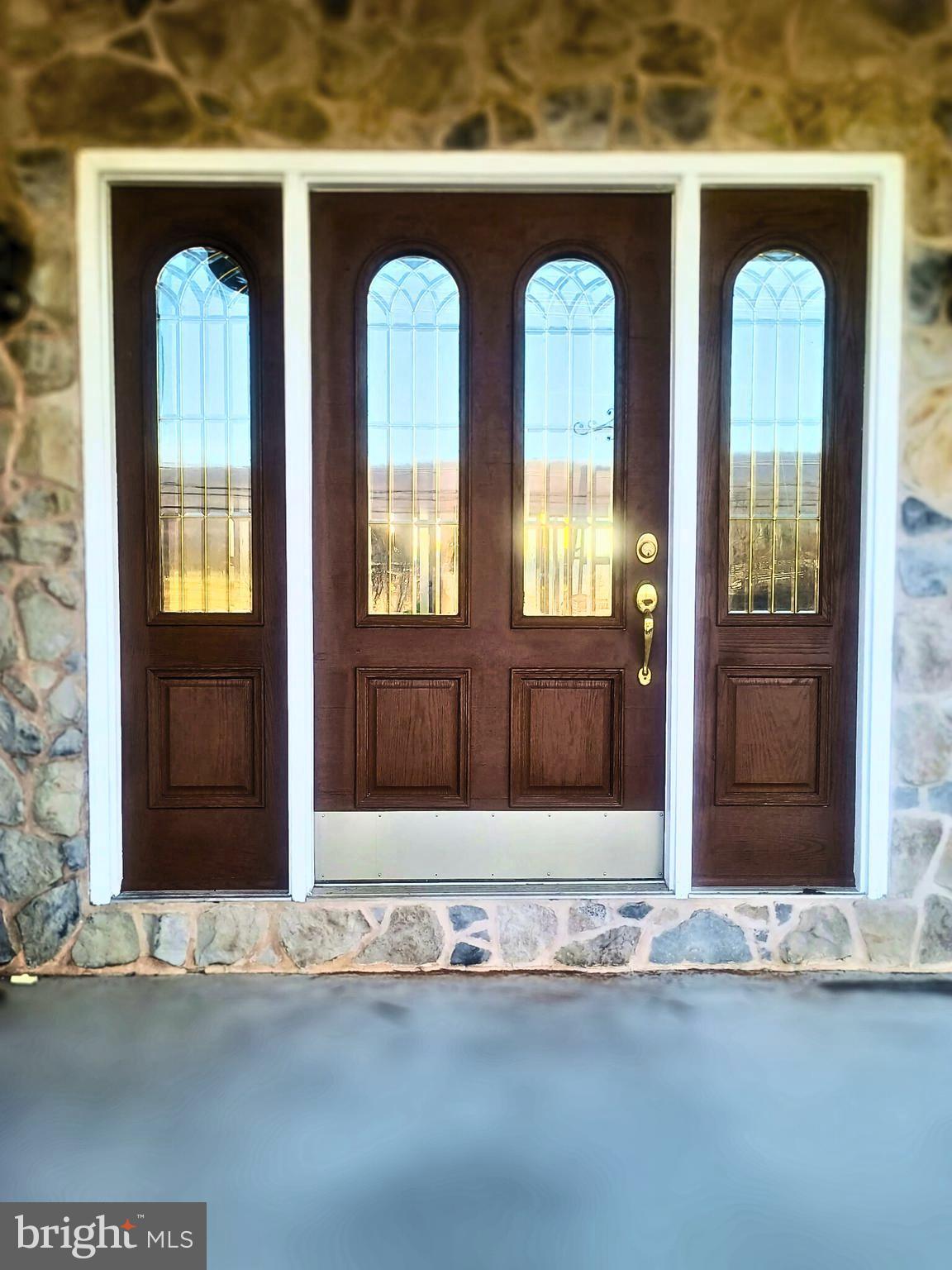 6859 Wertzville Road Enola, PA 17025 - Photo 7 of 60 a view of front door of a house