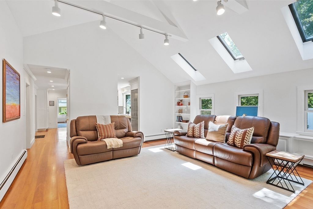 8 Piper Road Acton, MA 01720 - Photo 26 of 42 a living room with furniture and a couch
