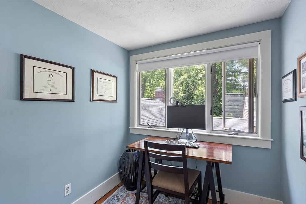 8 Piper Road Acton, MA 01720 - Photo 36 of 42 a view of a workspace with furniture and a window
