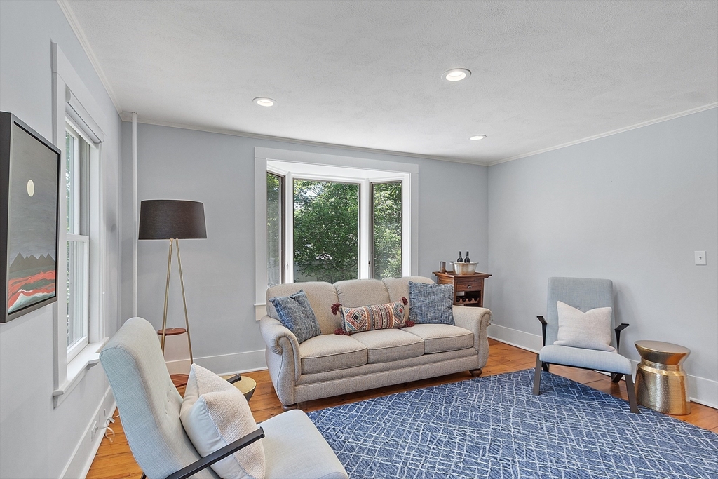 8 Piper Road Acton, MA 01720 - Photo 8 of 42 a living room with furniture and a window