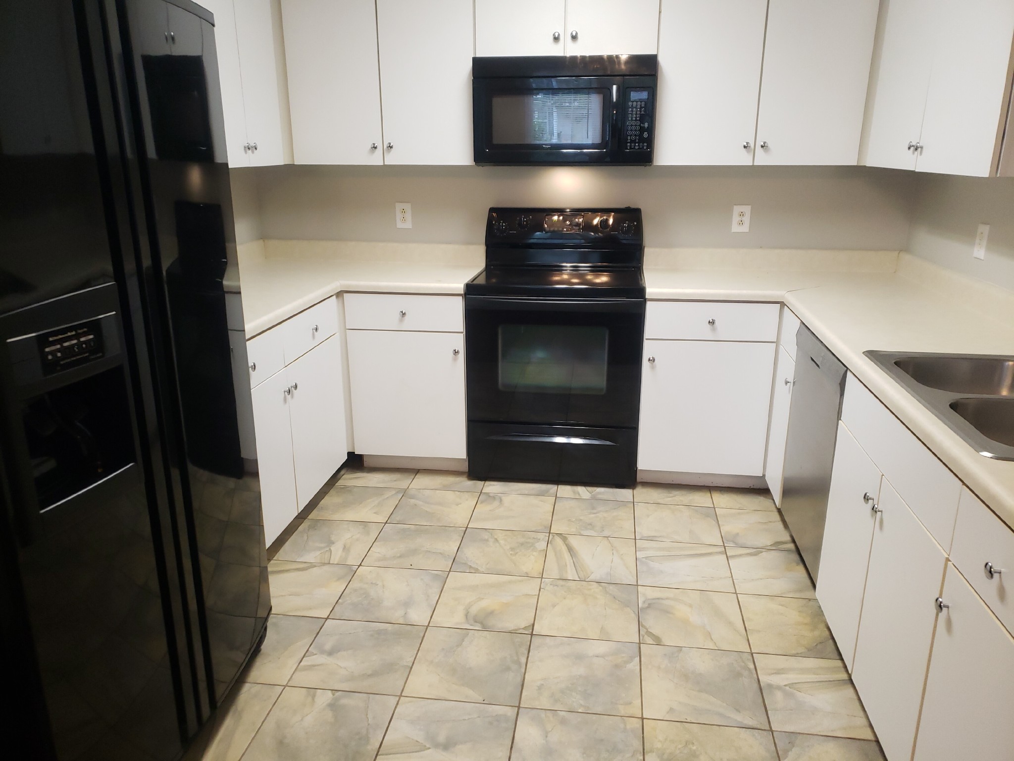2743 Painted Pony Drive Murfreesboro, TN 37128 - Photo 4 of 14 a kitchen with a sink and a stove top oven