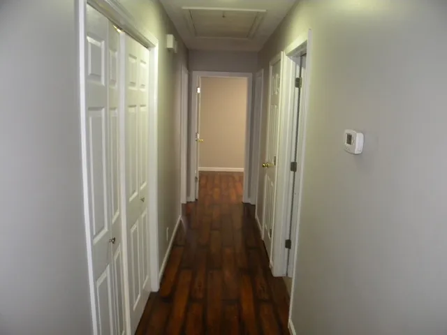 a view of a bathroom from the hallway