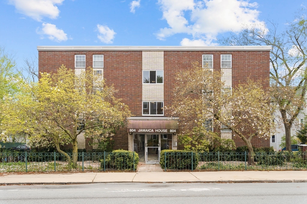 804 Centre Street, Unit 104 Boston, MA 02130 - Photo 20 of 32 a front view of house with yard