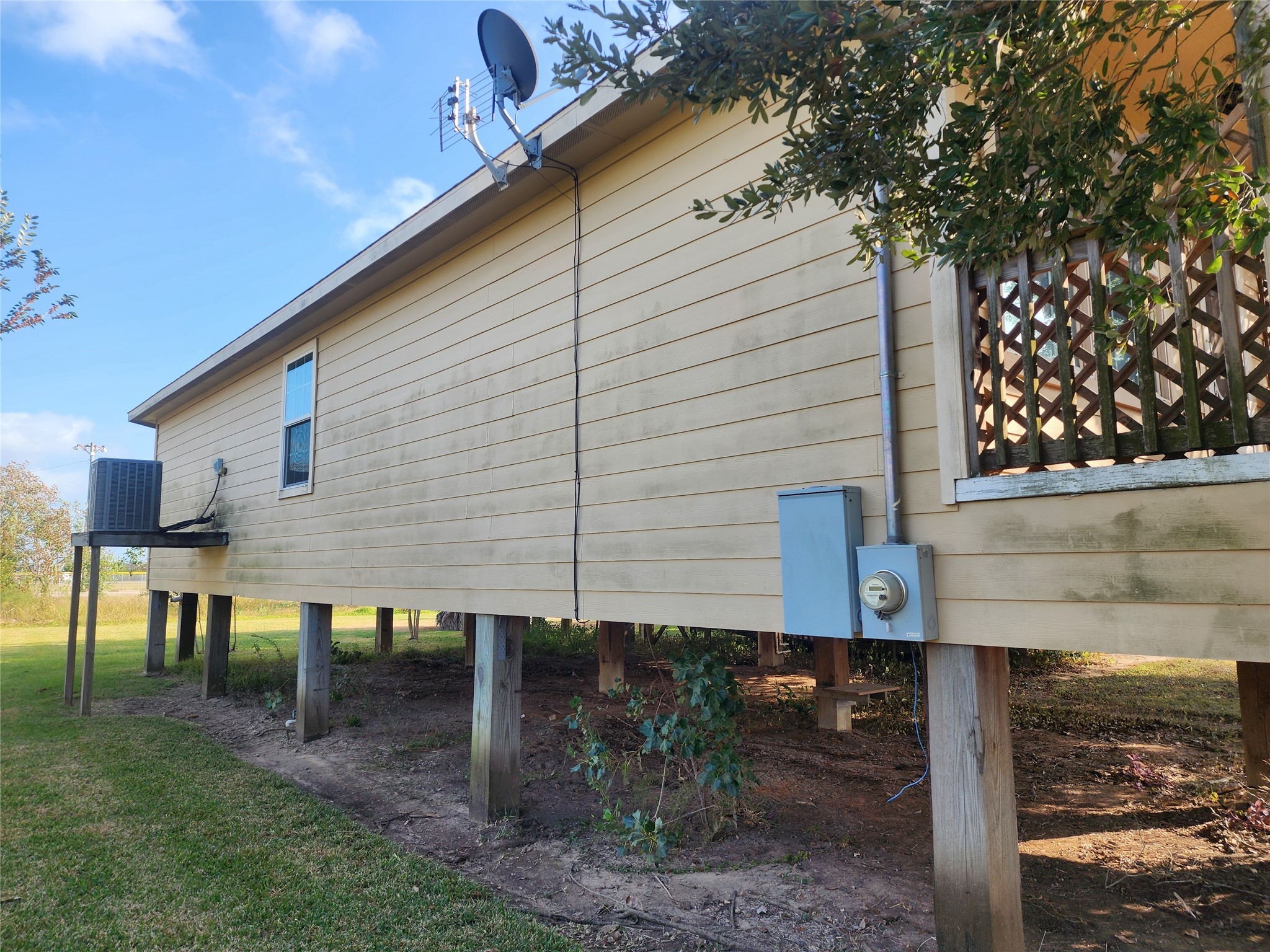315 20th Street Dickinson, TX 77539 - Photo 2 of 19 a front view of a house with garden