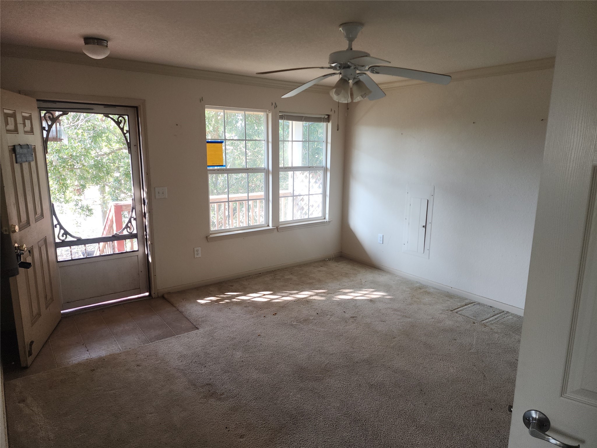 315 20th Street Dickinson, TX 77539 - Photo 8 of 19 a view of an empty room with a window