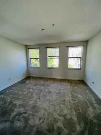 an empty room with windows