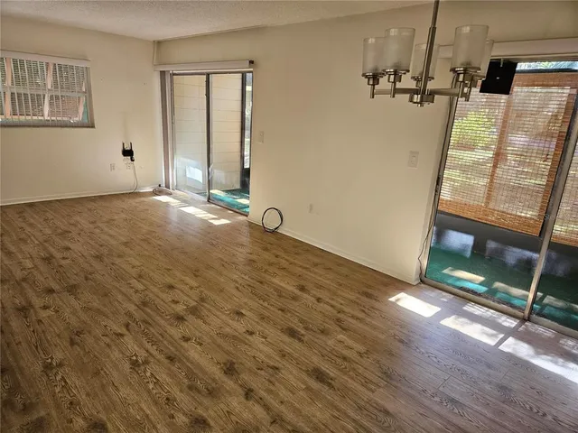 a view of a back yard from a balcony