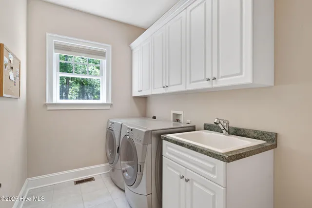 $620,000 | 118 Legacy Oaks Drive, Wallace, NC 28466