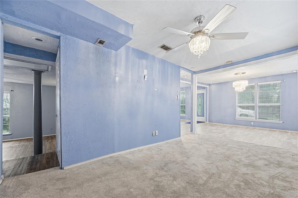 414 Thomas Street Terrell, TX 75160 - Photo 6 of 20 a view of an empty room with a window