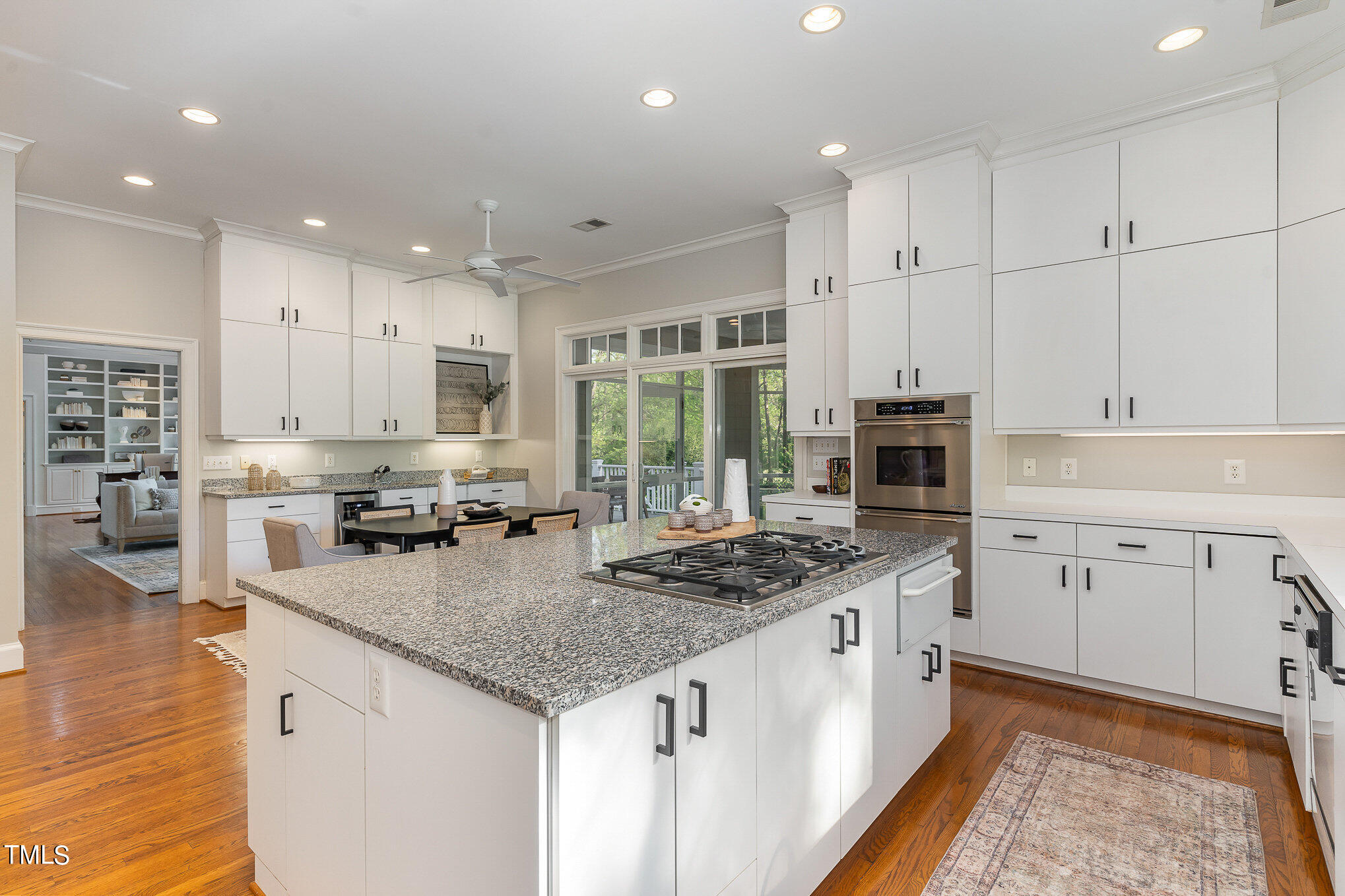 3737 Hope Valley Road Durham, NC 27707 - Photo 15 of 58 a kitchen with stainless steel appliances granite countertop a stove a sink and a refrigerator
