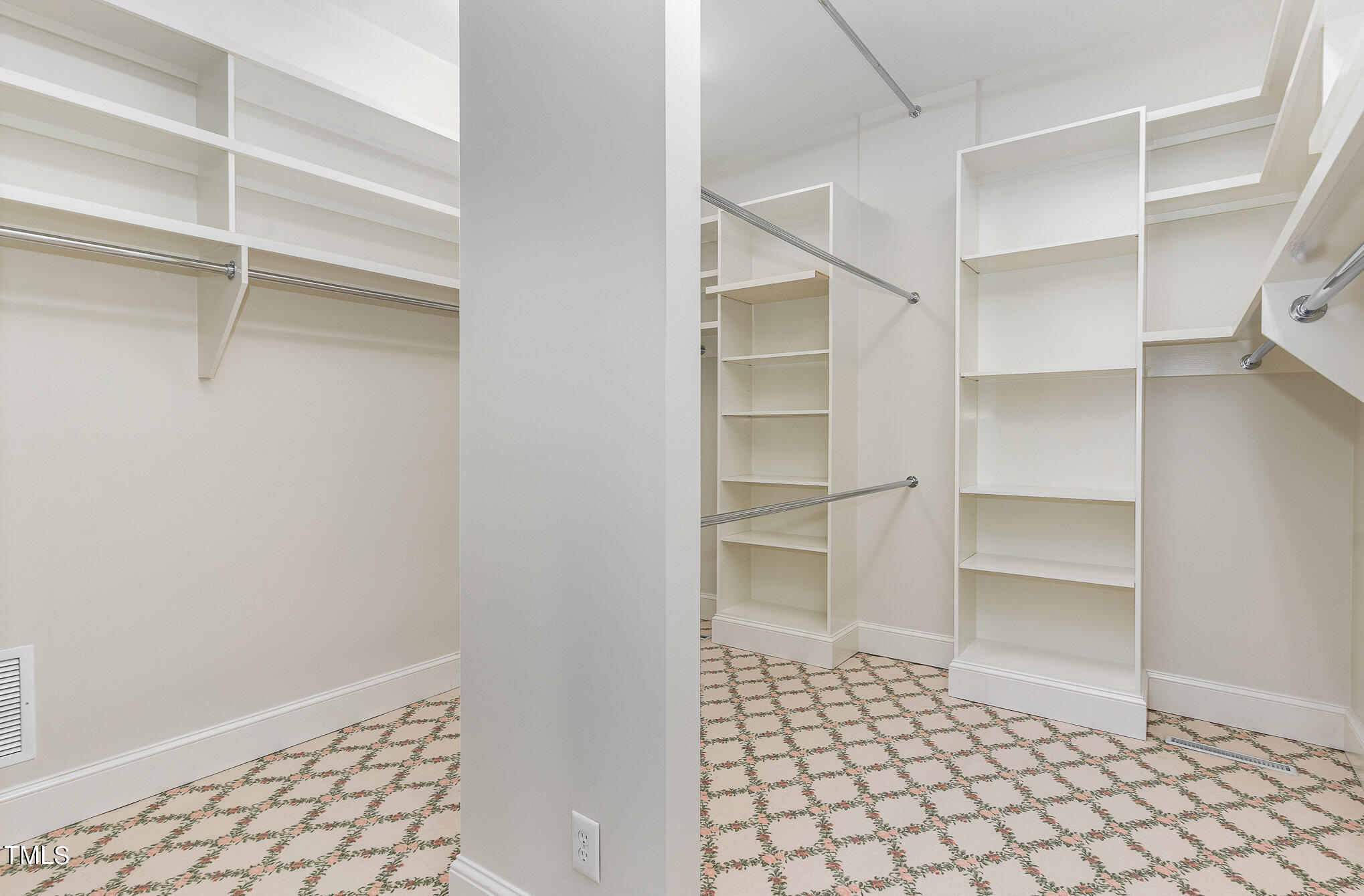 3737 Hope Valley Road Durham, NC 27707 - Photo 27 of 58 a room with walk in closet and wooden floor