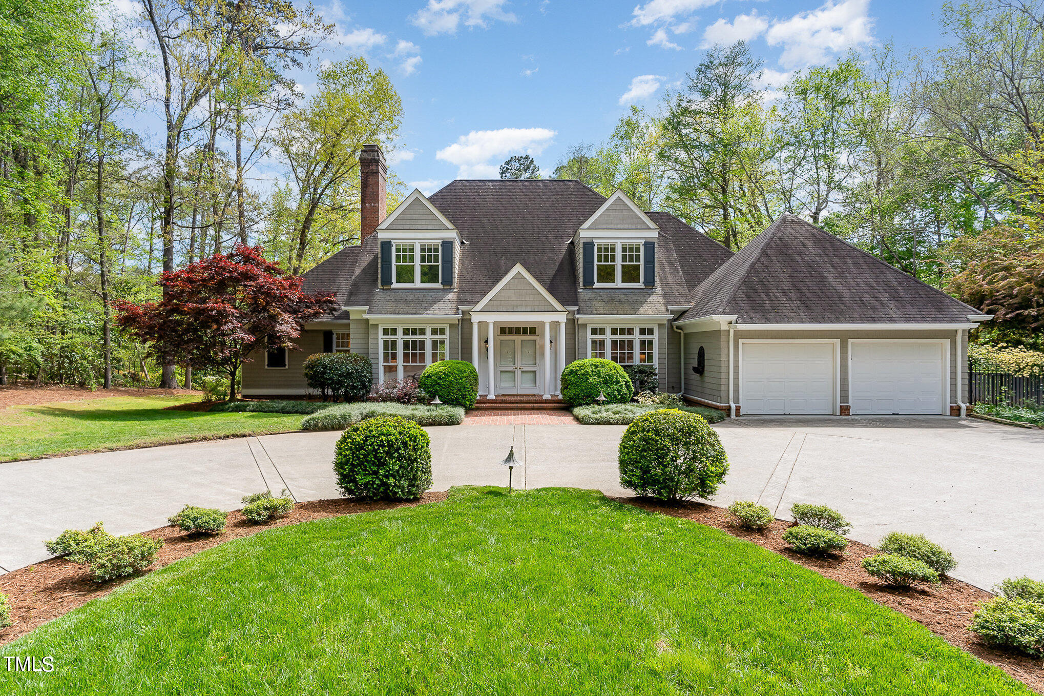 3737 Hope Valley Road Durham, NC 27707 - Photo 3 of 58 a front view of a house with garden