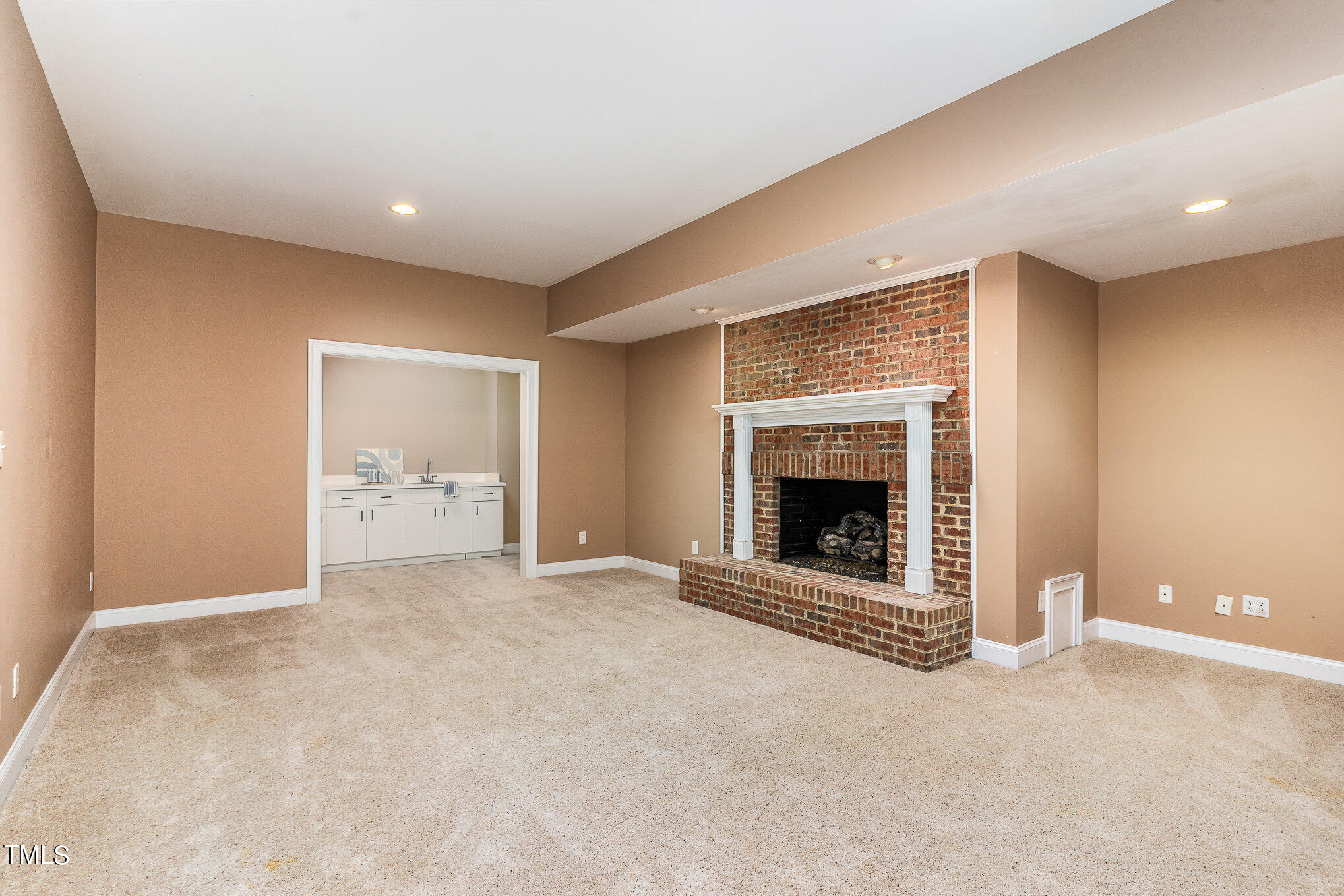 3737 Hope Valley Road Durham, NC 27707 - Photo 35 of 58 a view of an empty room with a fireplace and a window