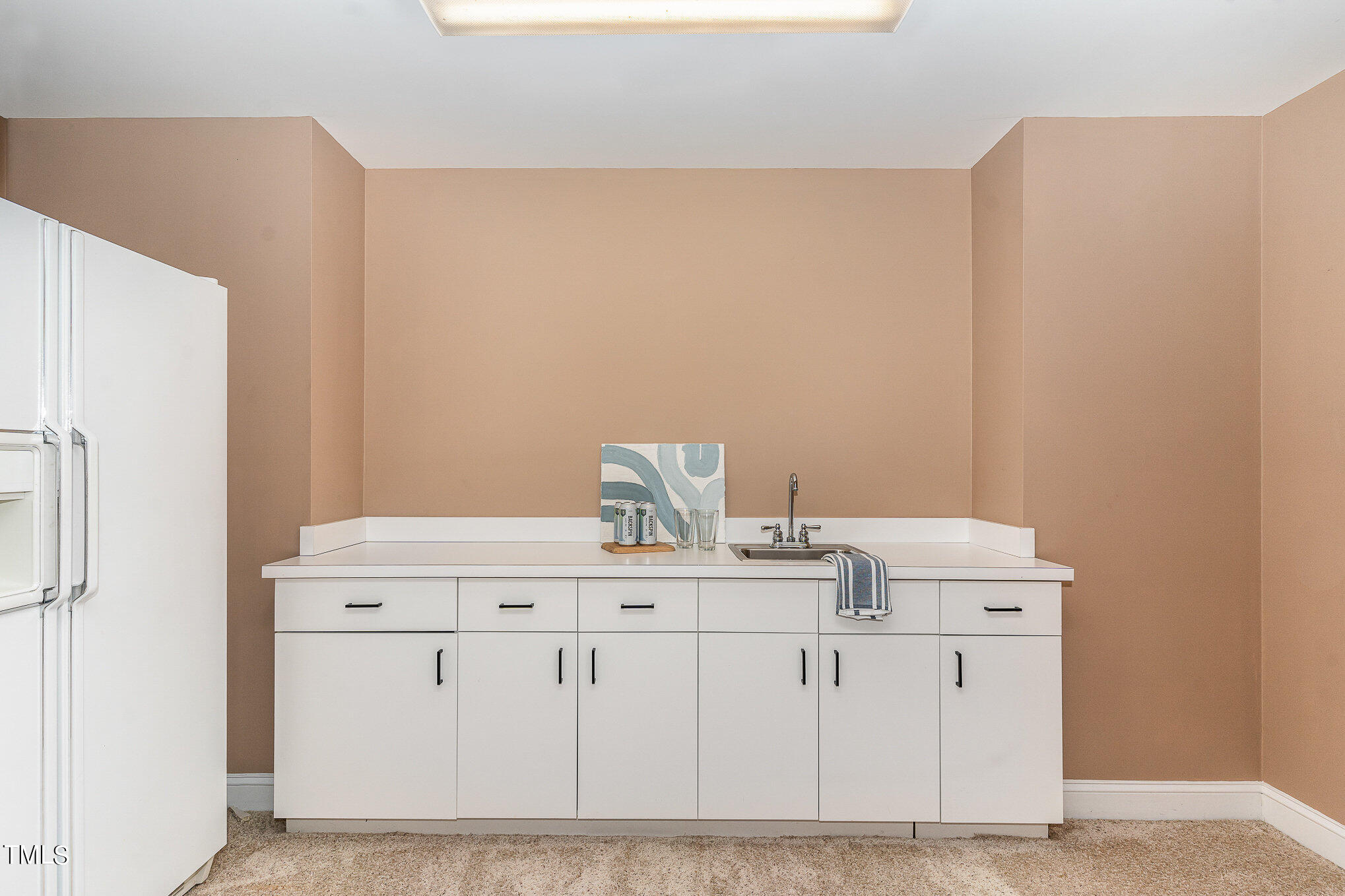 3737 Hope Valley Road Durham, NC 27707 - Photo 36 of 58 a view of cabinets with refrigerator