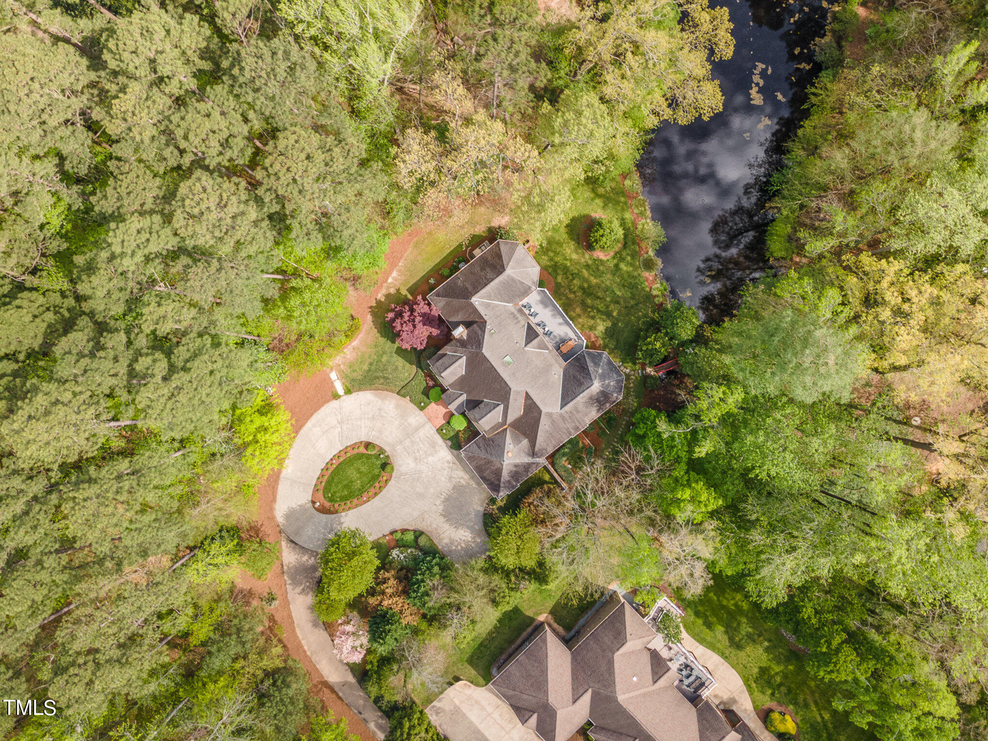 3737 Hope Valley Road Durham, NC 27707 - Photo 43 of 58 an aerial view of a house with a yard and plants