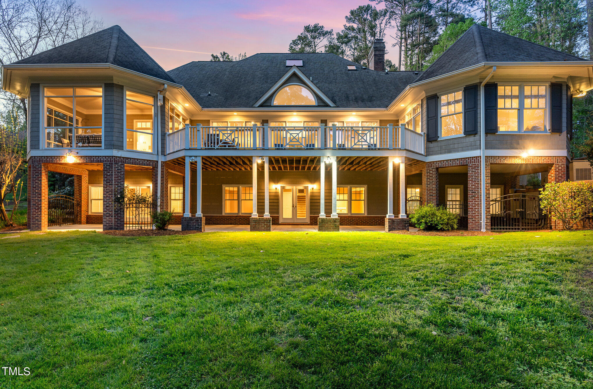 3737 Hope Valley Road Durham, NC 27707 - Photo 54 of 58 front view of a brick house with a yard