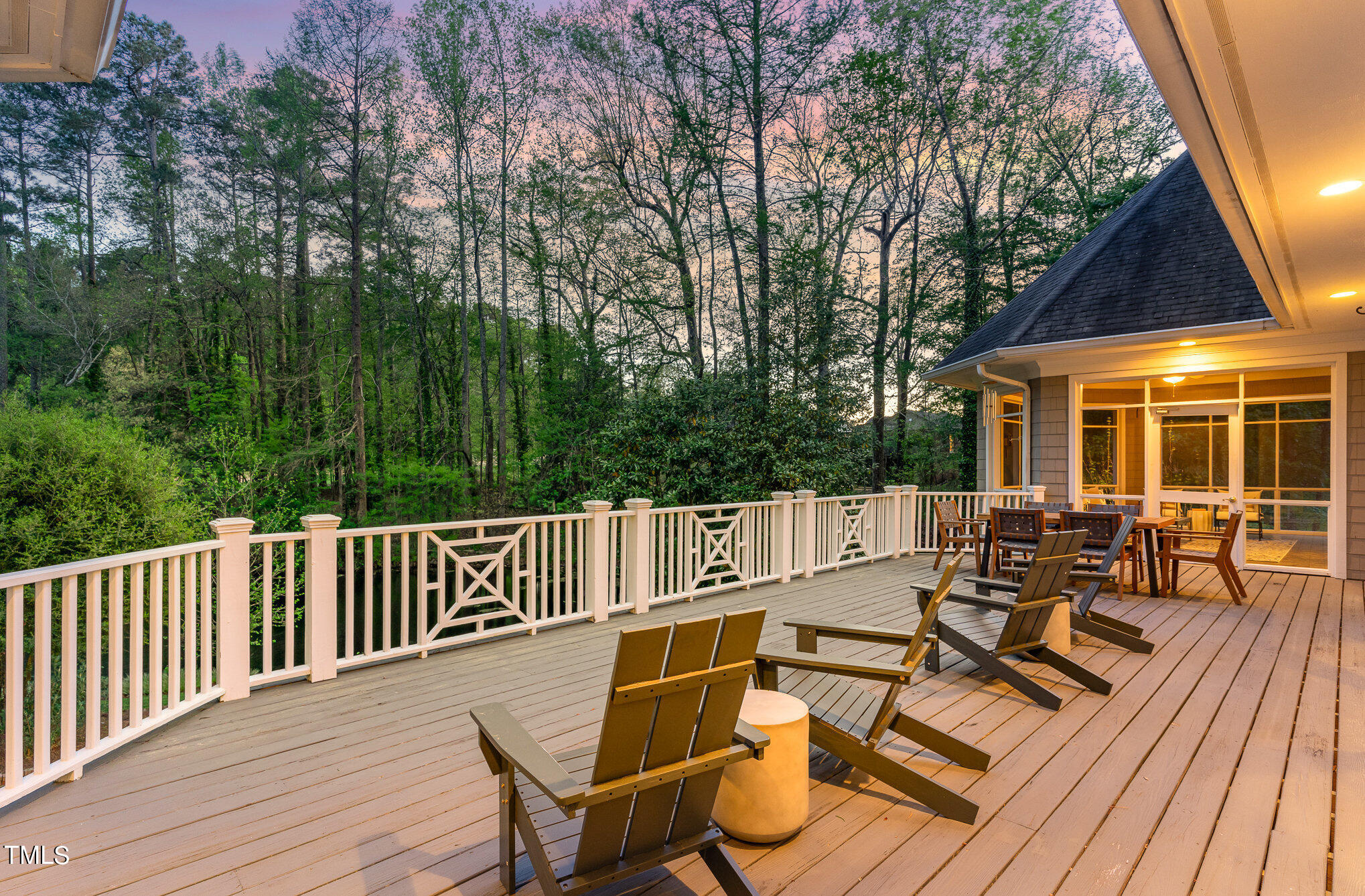 3737 Hope Valley Road Durham, NC 27707 - Photo 55 of 58 a view of a patio with wooden floor table and chairs