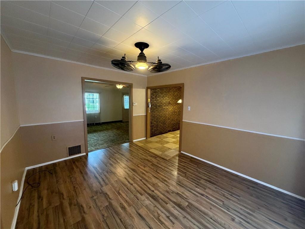 1041 4th Street Monongahela, PA 15063 - Photo 13 of 28 wooden floor in an empty room with a window