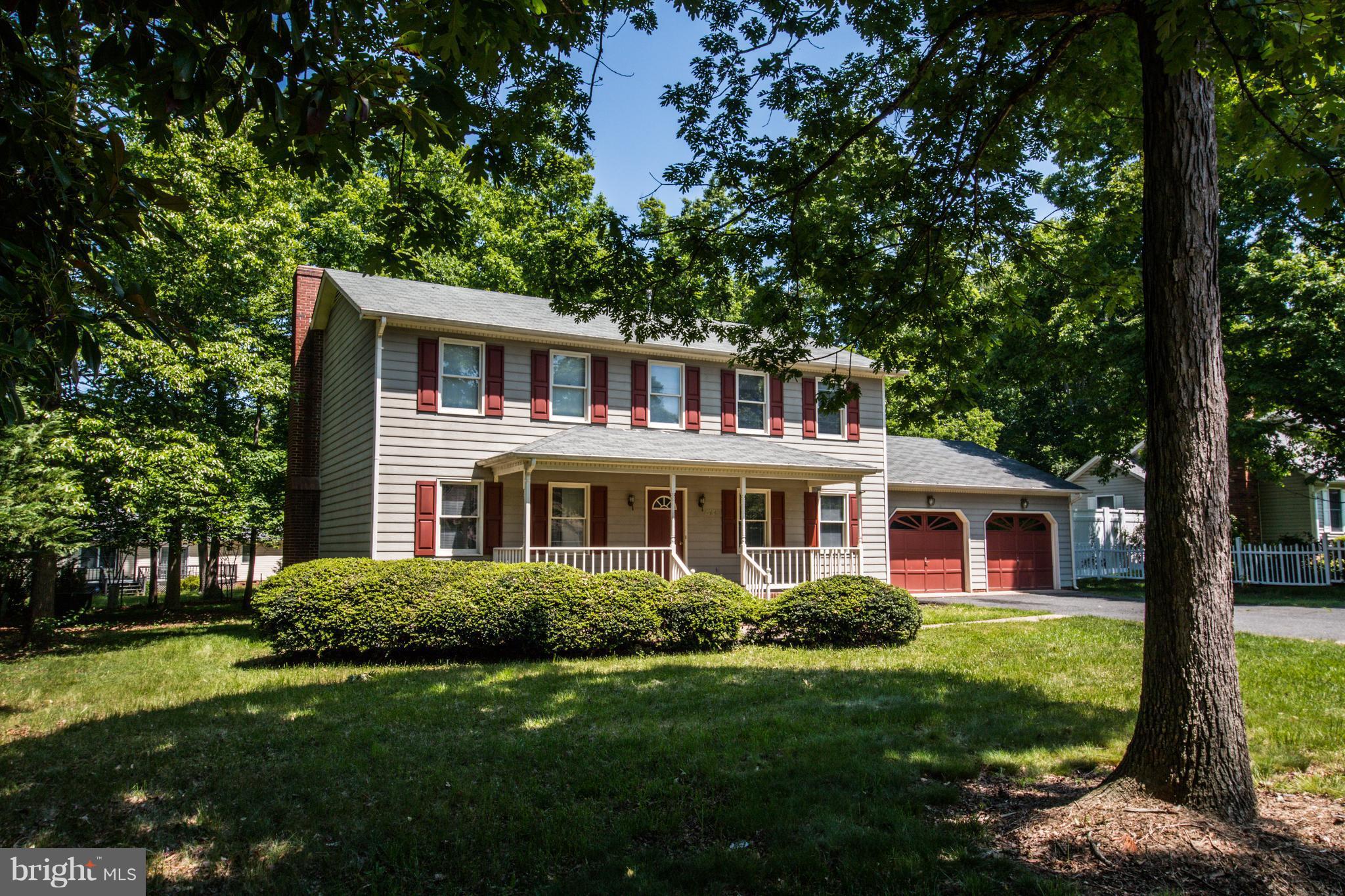 414 Ferry Road Fredericksburg, VA 22405 - Photo 1 of 28 a front view of a house with a yard
