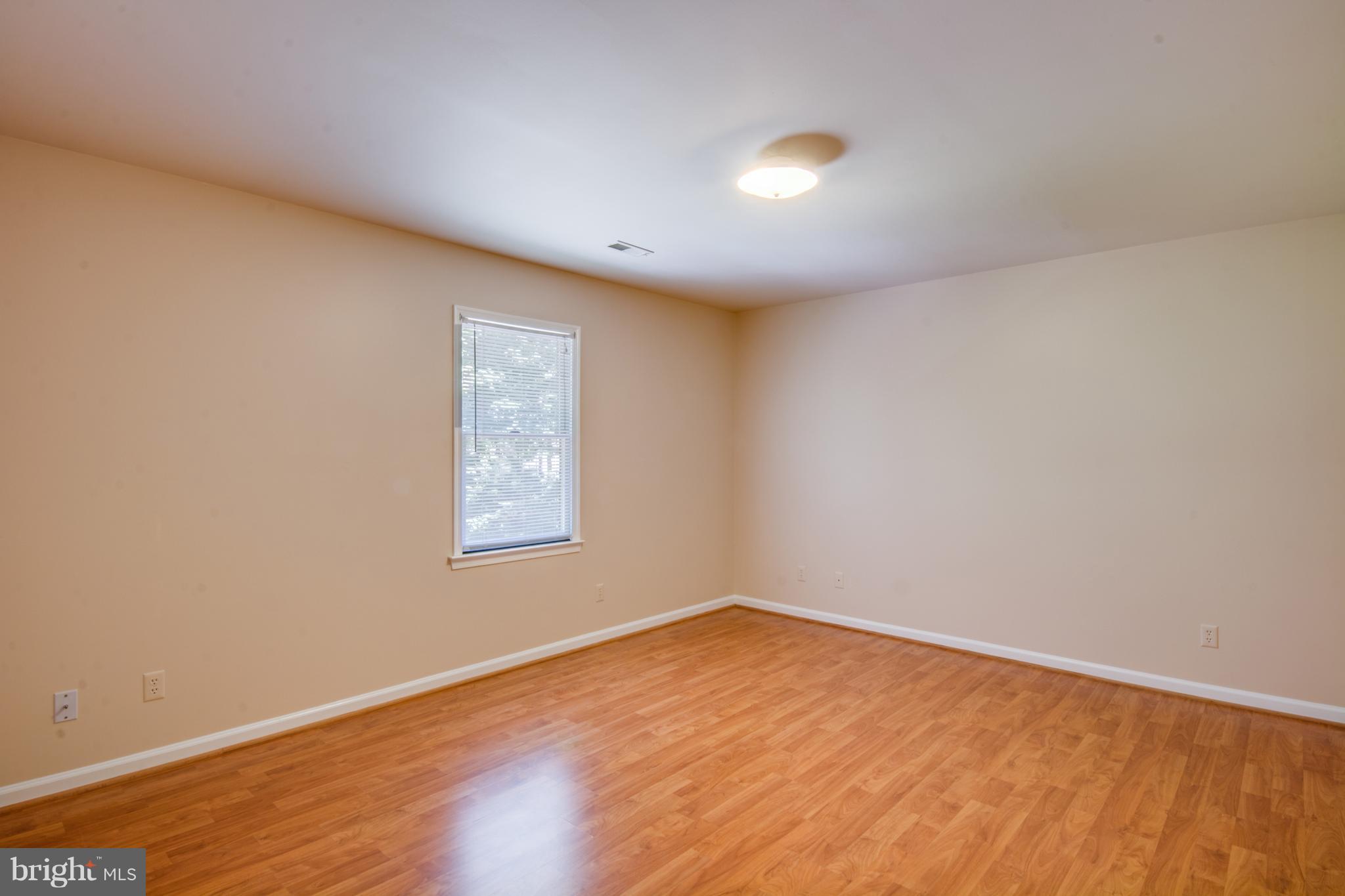 414 Ferry Road Fredericksburg, VA 22405 - Photo 18 of 28 a view of empty room with wooden floor and fan