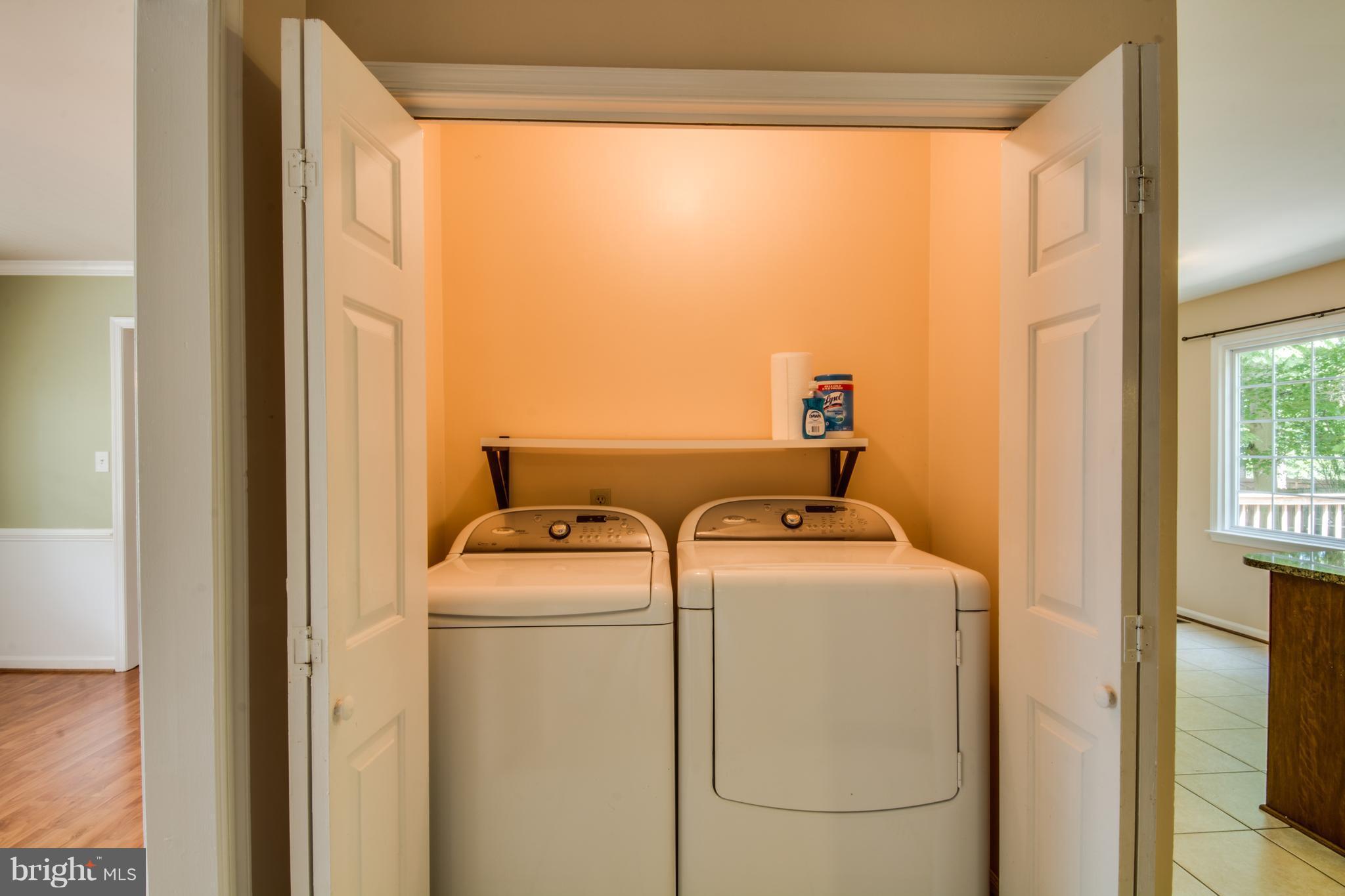 414 Ferry Road Fredericksburg, VA 22405 - Photo 22 of 28 a utility room with dryer and washer
