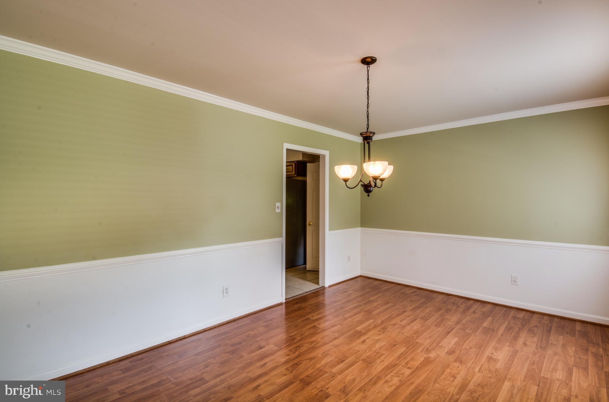 414 Ferry Road Fredericksburg, VA 22405 - Photo 4 of 28 a view of a room with wooden floor chandelier and entryway