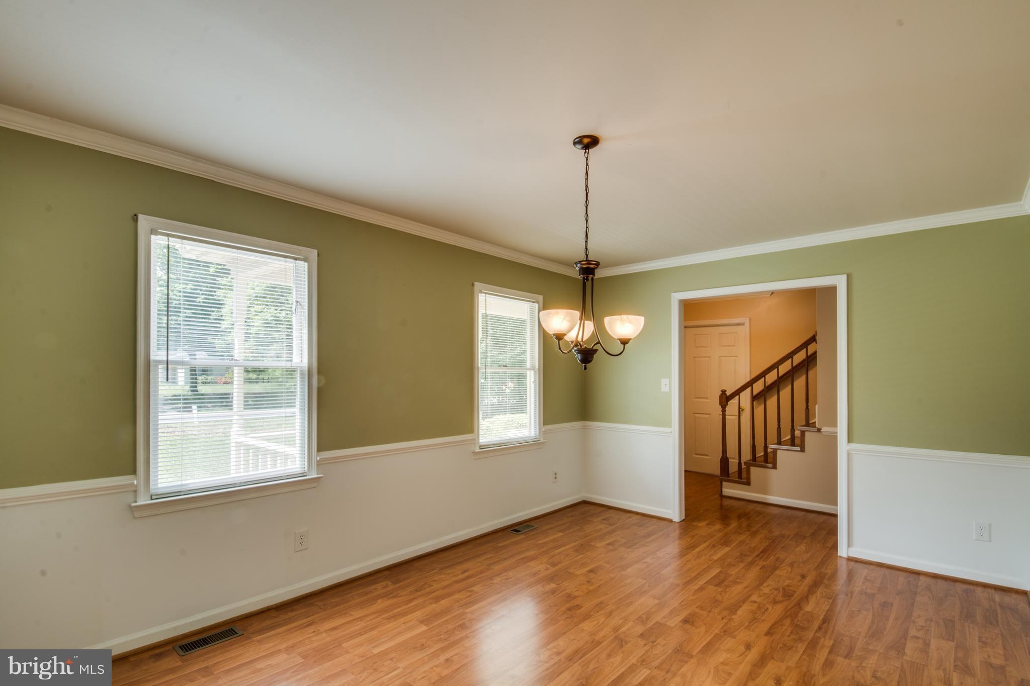 414 Ferry Road Fredericksburg, VA 22405 - Photo 5 of 28 a view of empty room with wooden floor and fan
