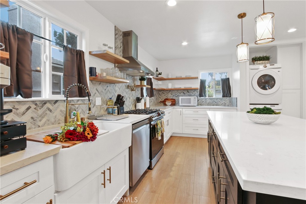 a kitchen with kitchen island granite countertop lots of counter top space
