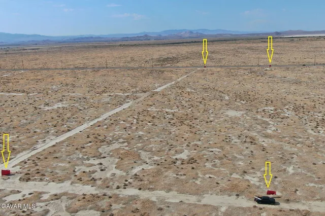 a view of beach and an ocean
