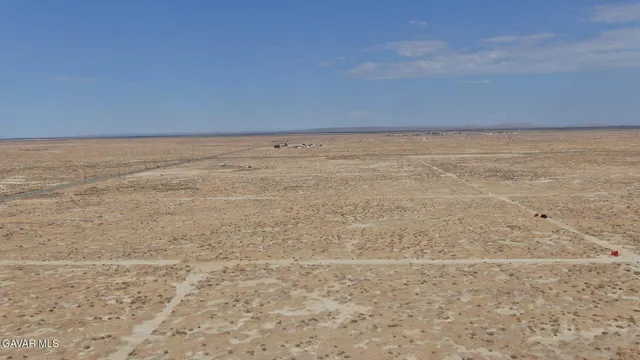 a view of wooden floor and a window