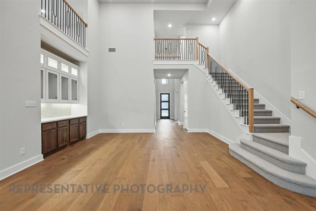 2716 Railway Street Forney, TX 75126 - Photo 17 of 25 a view of an entryway with wooden floor