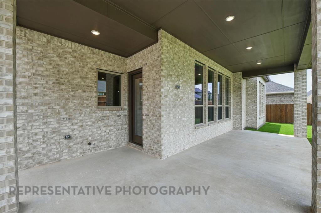 2716 Railway Street Forney, TX 75126 - Photo 24 of 25 a view of a big room with windows