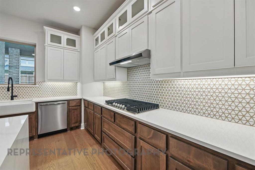 2716 Railway Street Forney, TX 75126 - Photo 6 of 25 a kitchen with cabinets and window