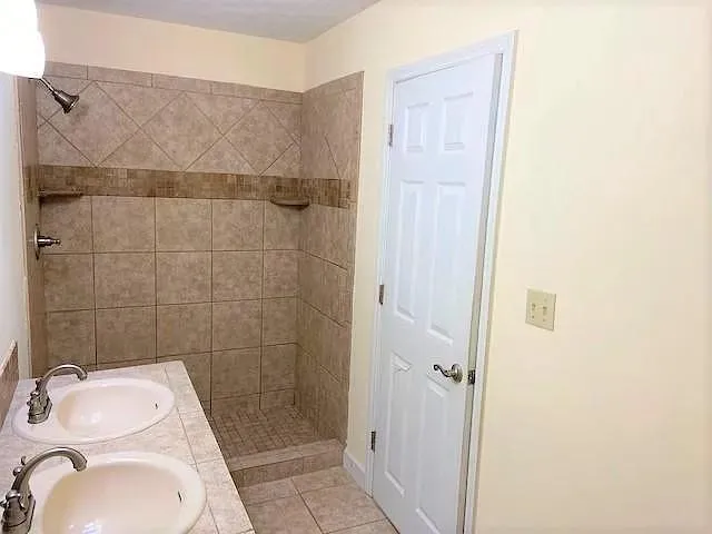 a view of a backyard of the house