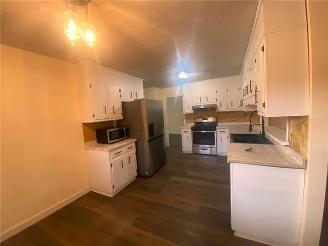 a bathroom with a toilet and a sink