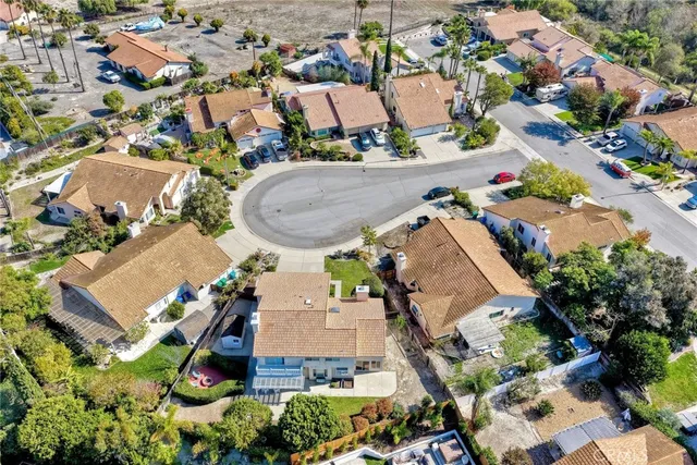 an aerial view of a house with outdoor space