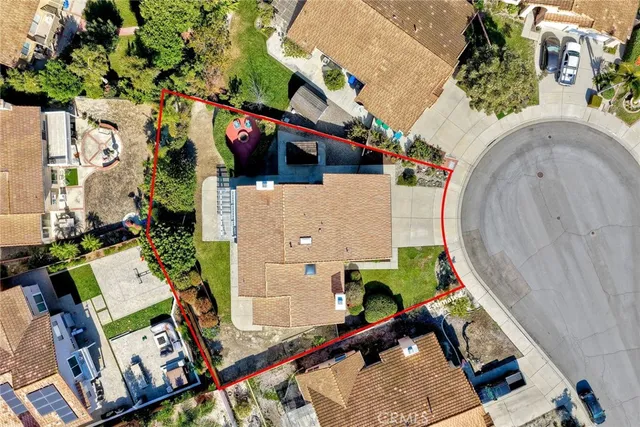 an aerial view of a highlighted house