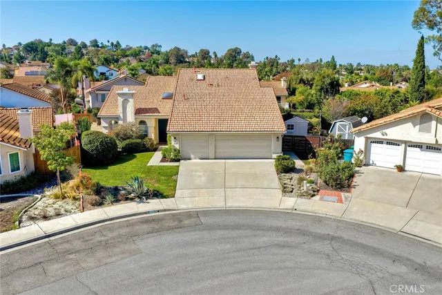 front view of a house with a street