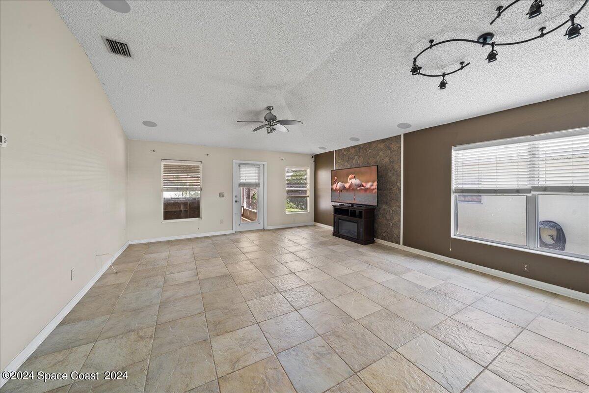 4850 Decatur Circle Melbourne, FL 32934 - Photo 12 of 35 a view of an empty room with a window