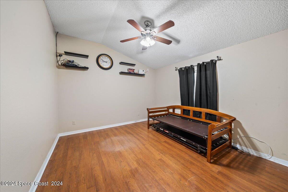 4850 Decatur Circle Melbourne, FL 32934 - Photo 25 of 35 a room with pool table and a chandelier