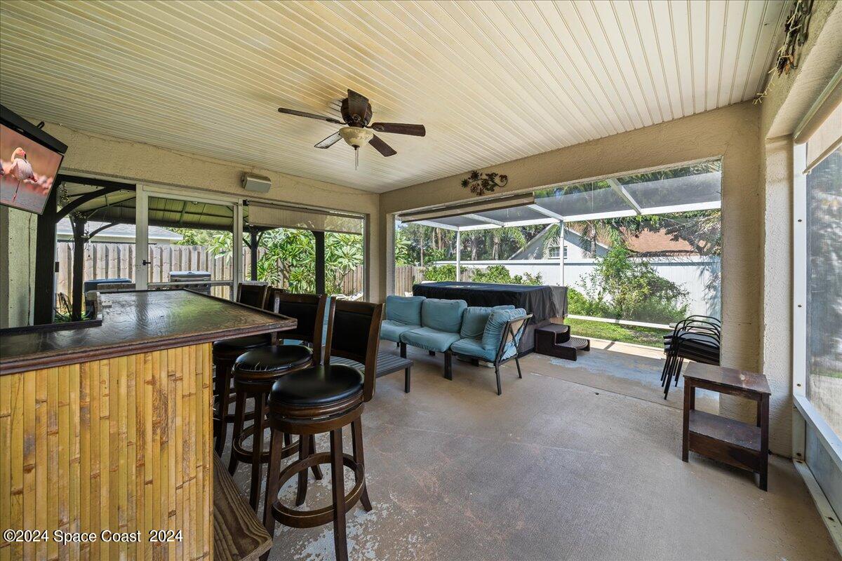 4850 Decatur Circle Melbourne, FL 32934 - Photo 29 of 35 a view of a dining room with furniture window and outside view
