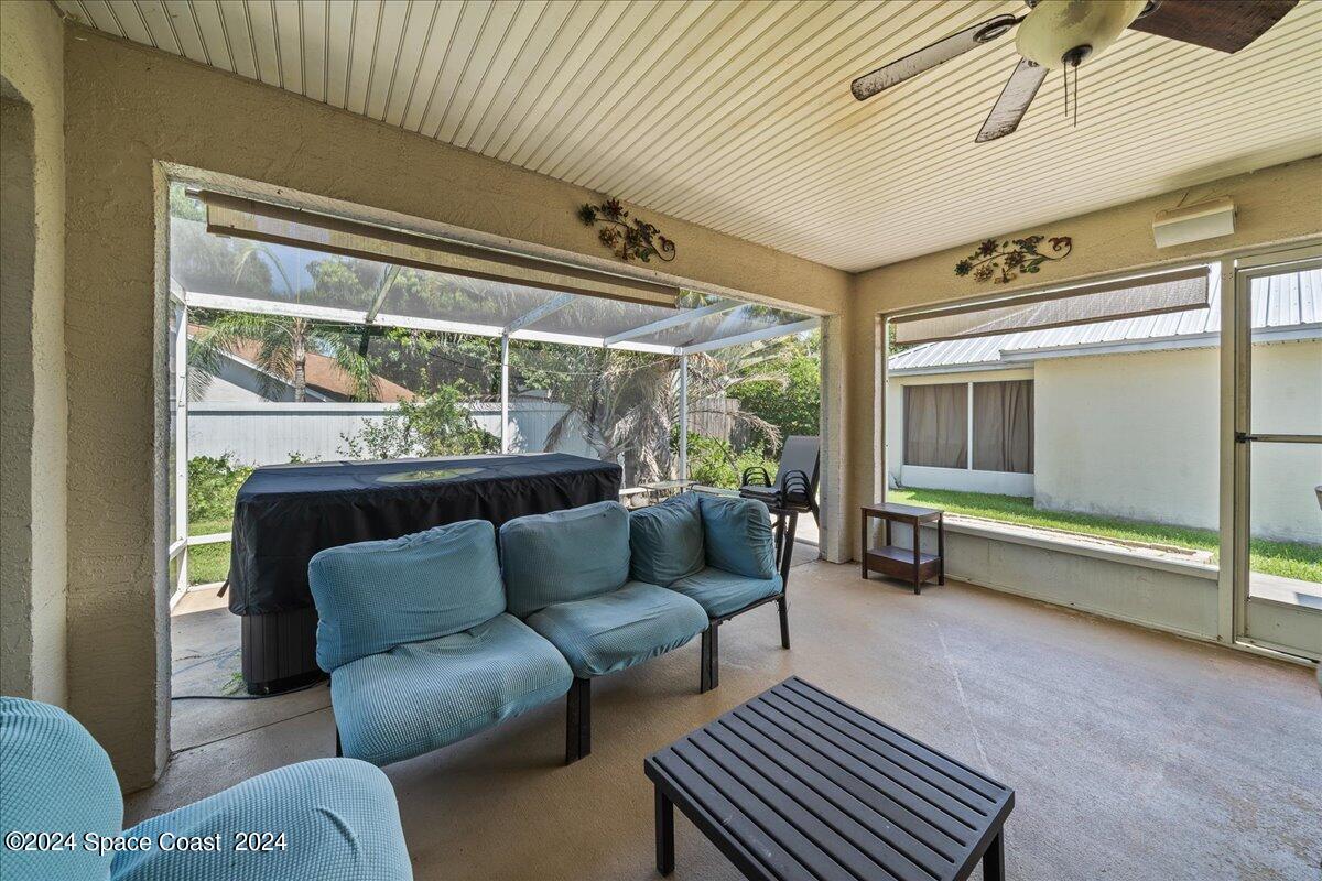 4850 Decatur Circle Melbourne, FL 32934 - Photo 31 of 35 a living room with furniture and a large window